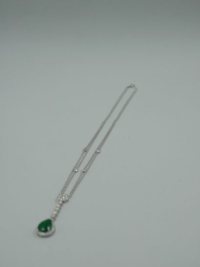 null Double row necklace in 18k white gold with a pear-shaped emerald of about 2cts...