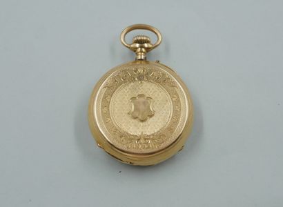 null 
Pocket watch in 18k yellow gold with guilloche decoration on the back of a...