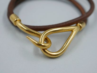 null HERMES Paris. Double row brown leather "Jumbo" bracelet with metal clasp. Length:...