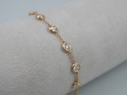 null 18k yellow gold bracelet with diamonds in closed setting weighing approximately...