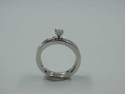 null Set of 2 small rings in 14k white gold and low title. One mounted in simulated...