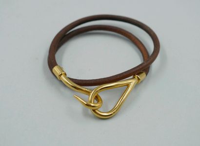 null HERMES Paris. Double row brown leather "Jumbo" bracelet with metal clasp. Length:...