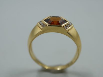 null An 18k yellow gold ring set with a square citrine and a line of diamonds. PB...