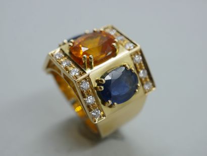 null An important 18k yellow gold Tank style ring set with an oval citrine weighing...