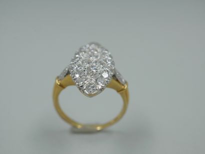 null 
Marquise ring in two 18k golds set with a pavement of diamonds for a total...