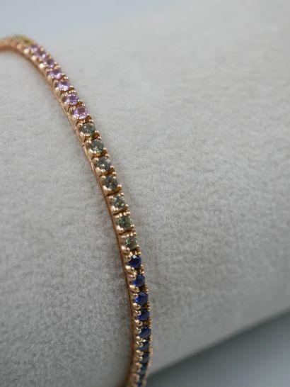 null 
Line bracelet in 18k pink gold set with multicolored sapphires: orange, green,...