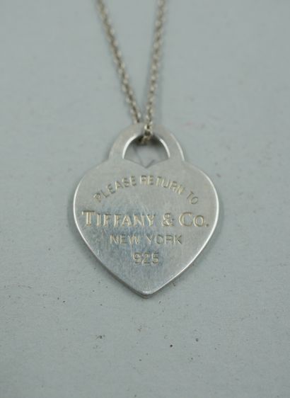 null TIFFANY Co, "Please return to" model. Heart pendant in engraved silver 925/1000....
