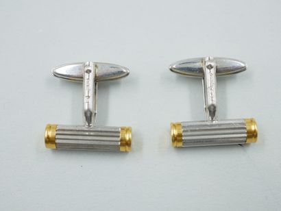 null DUPONT. Pair of gilt and silver plated metal cufflinks.