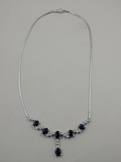 null 18k white gold drapery necklace set with six oval sapphires weighing a total...