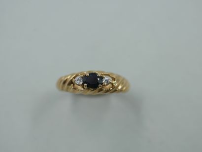 9k yellow gold ring with an oval sapphire...