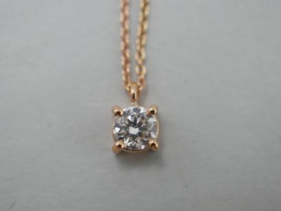 null 
18k rose gold pendant set with a 0.43cts I color diamond of SI1 clarity. With...