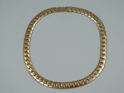 null Necklace in 14k yellow gold with flattened curb chain. Weight : 73,30gr.