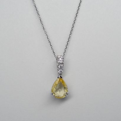 null 18k white gold pendant set with a pear-shaped yellow sapphire of about 1.50cts,...