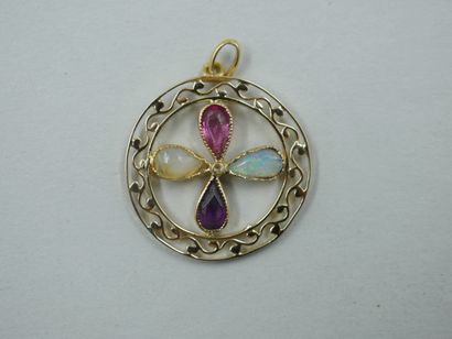 null 18k yellow gold openwork clover pendant set with opals and pink stones. The...
