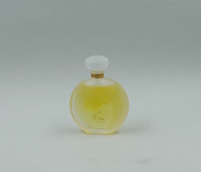 null NINA RICCI "Nina", Crystal bottle, dummy. Signed "Lalique". H : 9cm.