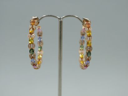null A pair of 18k yellow gold hoop earrings set with multicolored sapphires (orange,...