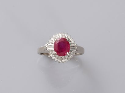 null 
Platinum ring presenting a round ruby of 1,50cts approximately accosted by...