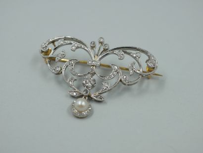 null 18k white and yellow gold scroll brooch set with old cut diamonds and holding...