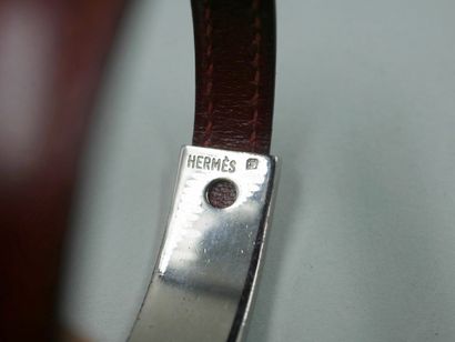 null HERMES Paris. Natural burgundy leather and silver plated metal bracelet with...