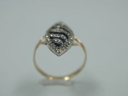 null Antique marquise ring in 18k yellow gold with marcasites on a blue enamel background....