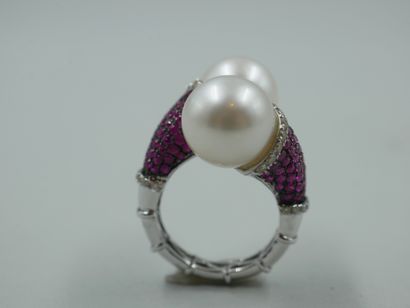 null 
You and Me ring in platinum set with two white cultured pearls of about 13mm...
