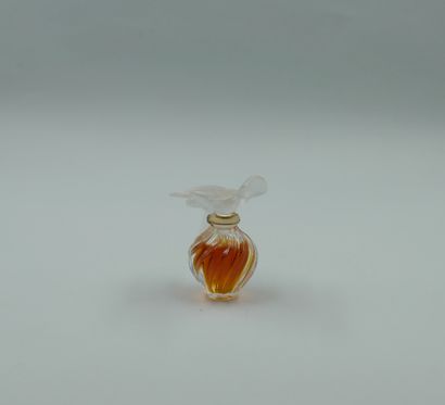 null NINA RICCI " L'air du Temps ", crystal bottle. Twisted body, stopper with two...