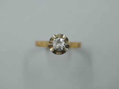 null 18k yellow and white gold solitaire ring set with a 0.25ct old cut diamond....