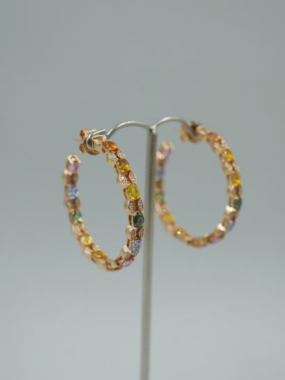null A pair of 18k yellow gold hoop earrings set with multicolored sapphires (orange,...