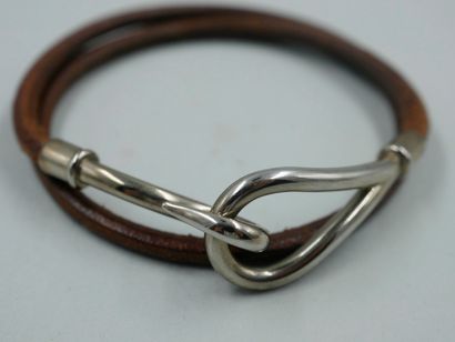 null HERMES Paris. Double row brown leather "Jumbo" bracelet with metal clasp. Length...