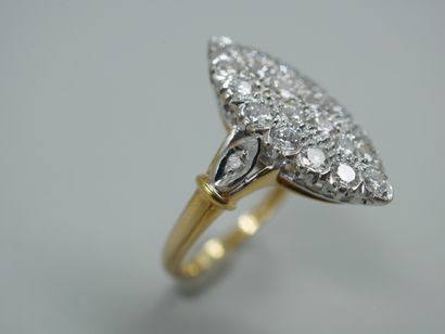 null 
Marquise ring in two 18k golds set with a pavement of diamonds for a total...