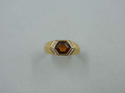 null An 18k yellow gold ring set with a square citrine and a line of diamonds. PB...