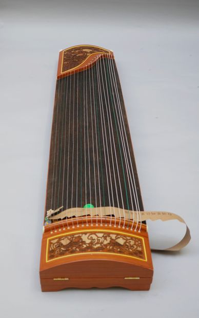 Chinese Guzheng. 
Sold as is, in a case.