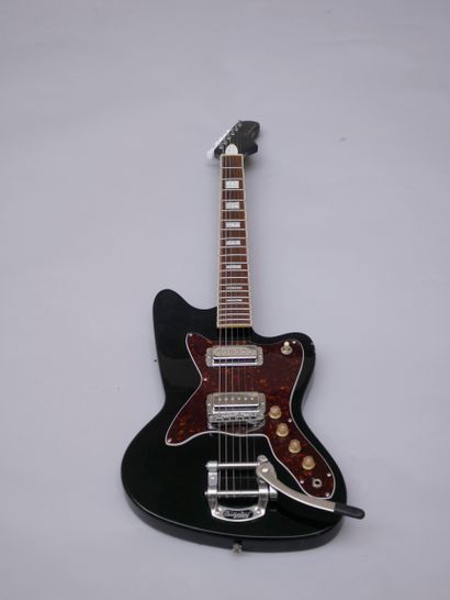  Solidbody electric guitar Silvertone model 1478, made in Indonesia. 
Good condition,...