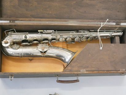 null Tenor saxophone brand Couesnon with its mouthpiece and elbow. 

Sold as is;...