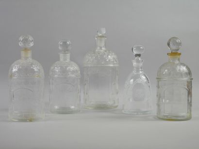 null GUERLAIN.

Set of four bottles model bee in blown-molded glass, without labels....