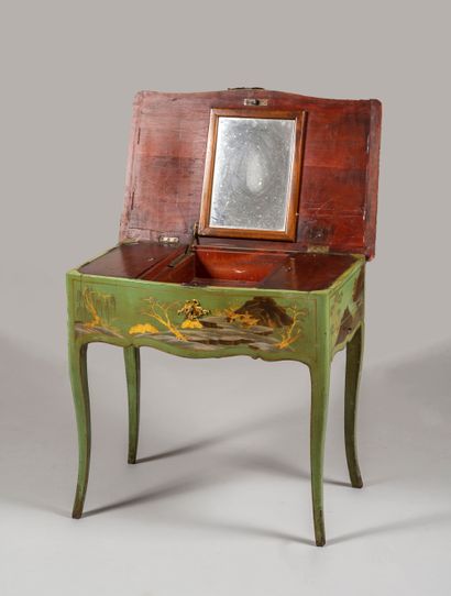 null A lacquered wood and Chinese lacquer panels dressing table decorated with scenes...