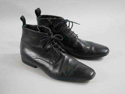 null 
KENZO. Pair of black leather shoes. 

Size 6,5. (Probably corresponds to a...