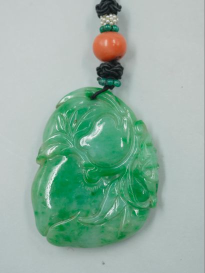 null CHINA. 

Jade amulet pendant representing a bat topped with coral and cultured...