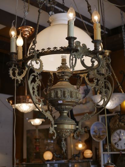 null Large brass suspension with nine lights on three arms, central globe in white...