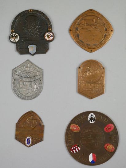 null Set of metal racing plates, some enamelled.