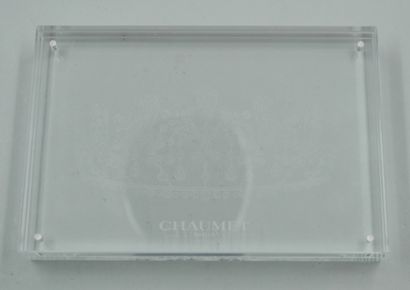 null CHAUMET. 

Plexiglas photo frame with magnets. It is signed Chaumet and engraved...
