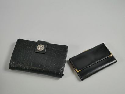 null Lot LE TANNEUR. Two black leather wallets. 

(As is).