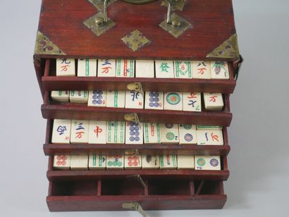 null CHINA 20th century

MAH-JONG game box

In lacquered wood and ivory

Height :...