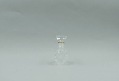 null Nina RICCI and LALIQUE for "Capricci". 

Transparent crystal bottle with diamond-shaped...
