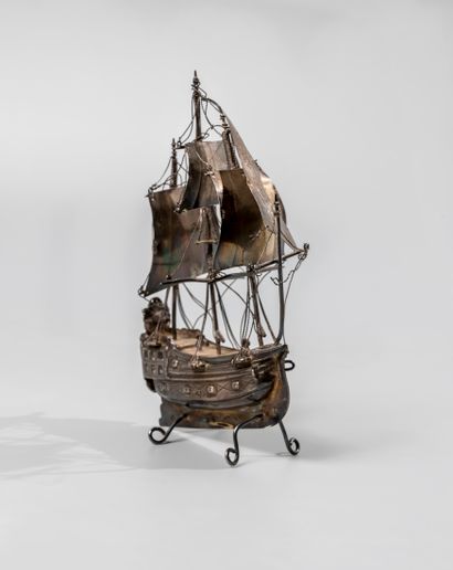 null Model ex-voto in silver. Silver ship, three masts and its sails. A ship with...