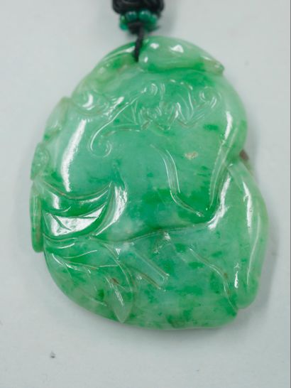 null CHINA. 

Jade amulet pendant representing a bat topped with coral and cultured...