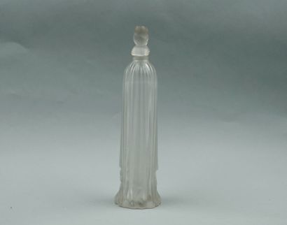 null Perfume bottle "Robe longue" in pressed moulded glass. Stopper with a knot pattern....