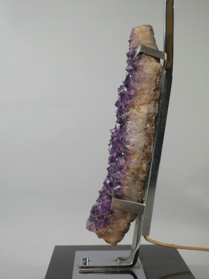 null An important Brazilian amethyst mounted as a lamp and electrified, consisting...