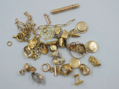 null Gold debris: teeth, rings, needle holder, and various. PB : 60,20gr.