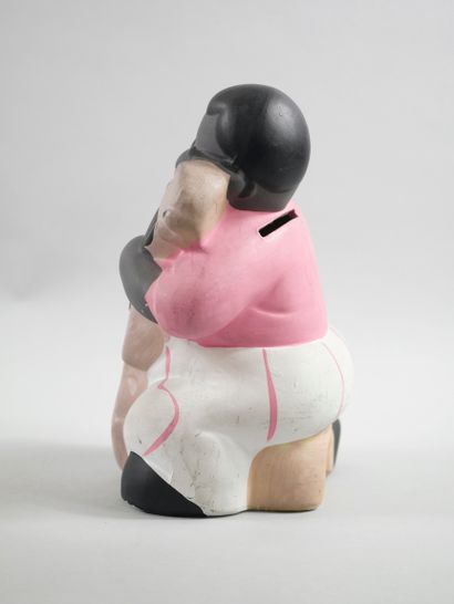 null Double bass player. 

Polychrome ceramic proof, forming a money box. 

Around...